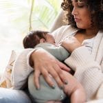Photo of woman breastfeeding baby