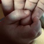 mom and baby hands photo