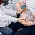 Photo of pregnant woman with obgyn