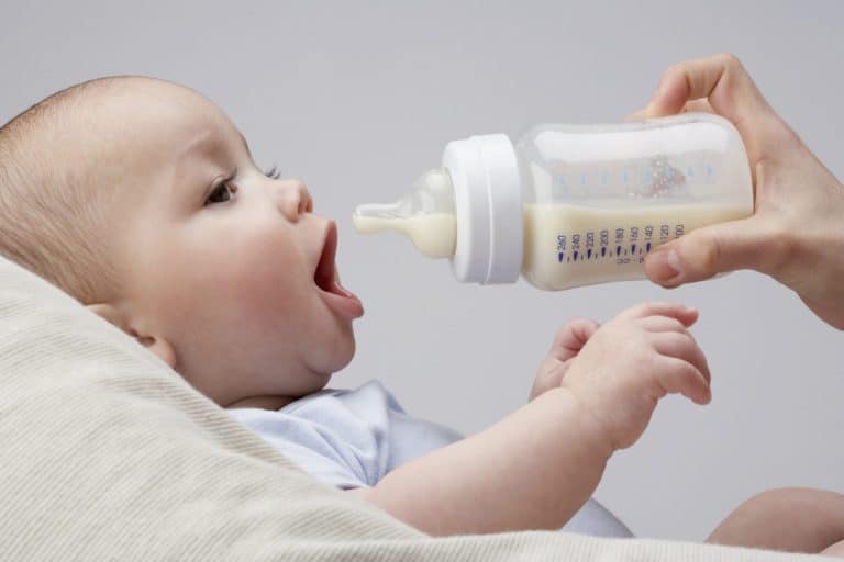 Photo of baby with bottle
