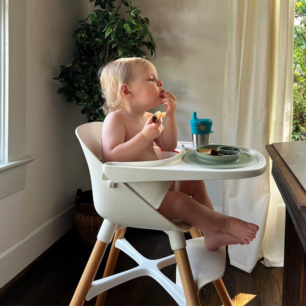 Photo of toddler in high chair